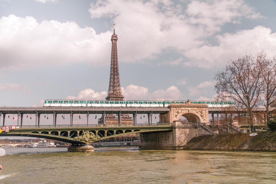 A metro passes in front of the Eiffel tower in Paris